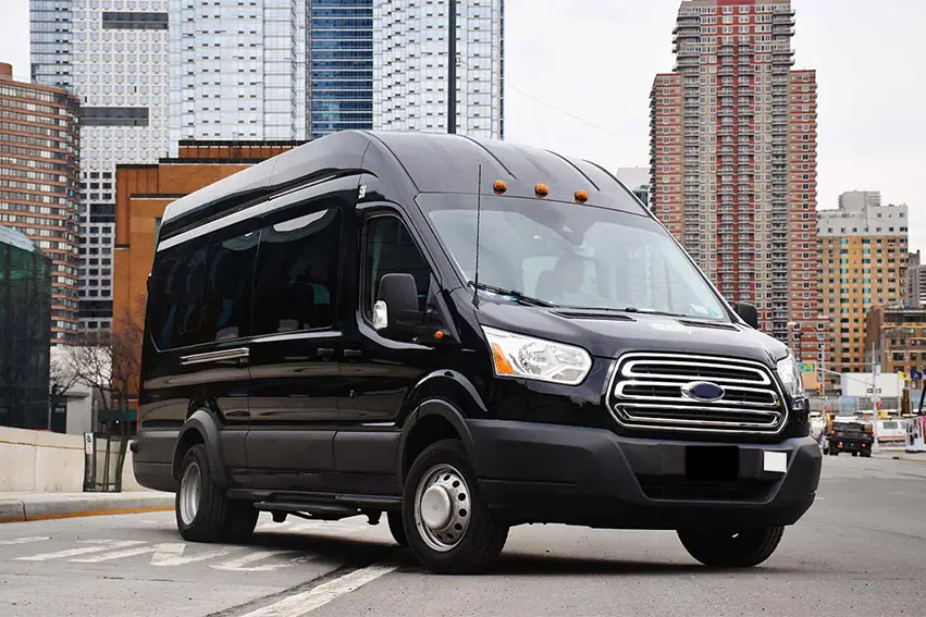 a black van parked in front of a building