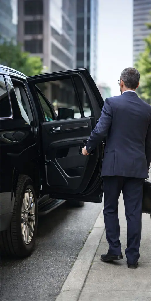 Professional chauffeur for Limo Service South Bay providing luxury airport and event transportation.