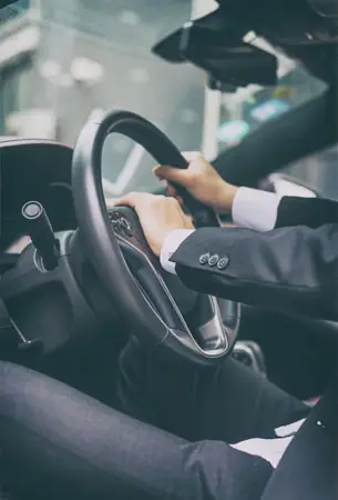 Detail of a professional chauffeur providing white-glove event transportation services in South Bay.