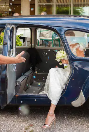 Classic Wedding Transportation South Bay - Bride in Vintage Blue Limo
