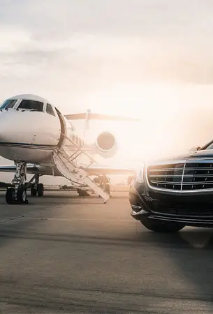 Luxury Mercedes-Benz car service parked on the tarmac next to a private jet for VIP airport ground transportation.